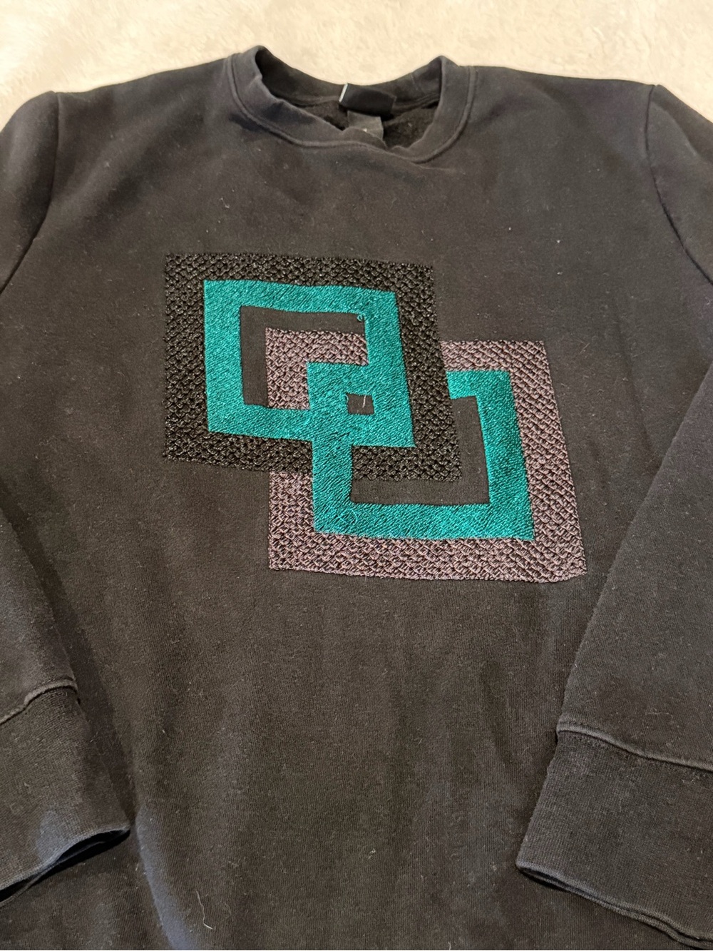 H&M Black Crewneck Sweatshirt with Teal & Mauve Geometric Embroidery